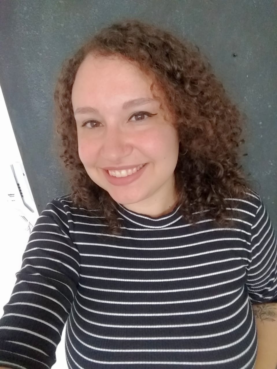 avatar com o perfil da Larissa sorrindo